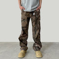 Salopette camouflage integrale Valstrend con stampa completa e dettagli distressed, tessuto resistente e stile urbano.