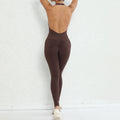 Tuta yoga valstrend donna con scollo a halter, schiena nuda, palletti e tasche, in tessuto color pesca per fitness e sport