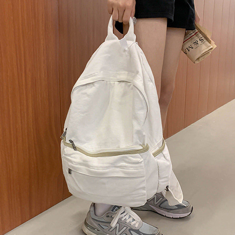 Zaino in tela lavata vintage grande capacità Valstrend, stile retrò con ampio scomparto e tasche robuste, ideale per uso quotidiano.