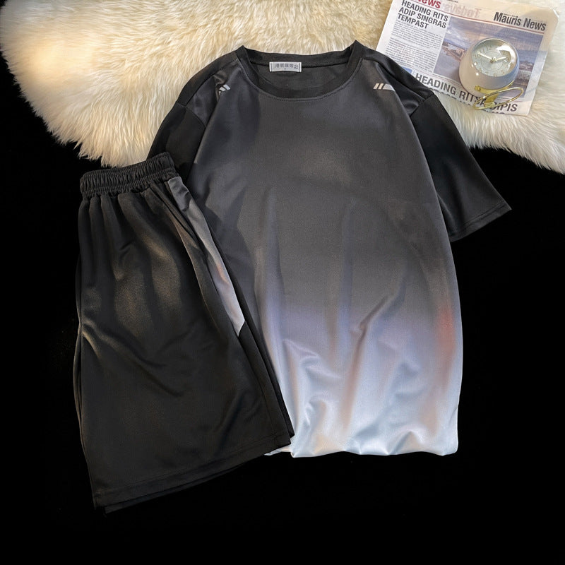 Completo sportivo da uomo Valstrend, abbigliamento da corsa fitness con giacca e pantaloni in tessuto tecnico, stile atletico.