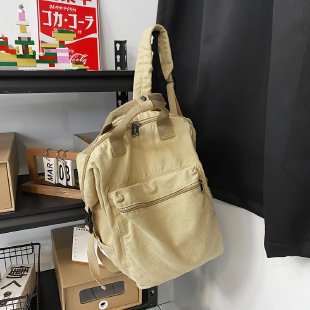 Zaino in tela washed stile coreano grande capacità, retro e Mori, marca Valstrend, con dettagli e tasche visibili.