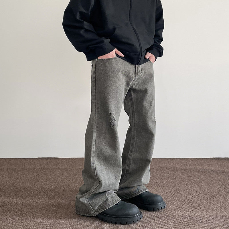 Jeans uomo Valstrend Shop a gamba dritta retrò con effetto consumato e strappi, stile casual e di tendenza.