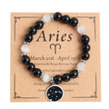 Bracciale in acciaio inossidabile con ciondolo tondo a costellazioni e pietre naturali, stile elegante e dettagli raffinati.