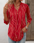T-shirt donna casual a maniche lunghe con stampa geometrica e bottoni, marchio Valstrend, tessuto morbido e comodo.