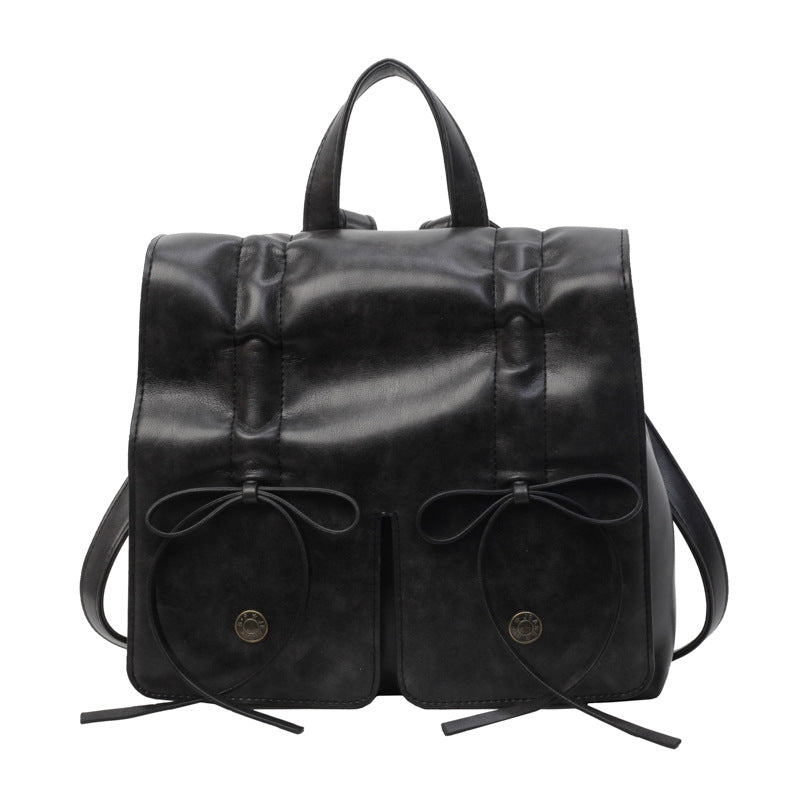 Borsa Valstrend in pelle morbida con fiocco, grande capacità, tracolla versatile, perfetta per il pendolare e uso quotidiano.