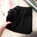 Pantaloni larghi in seta ghiaccio per donna, pantaloni casual Valstrend, tessuto morbido e leggero con taglio ampio.
