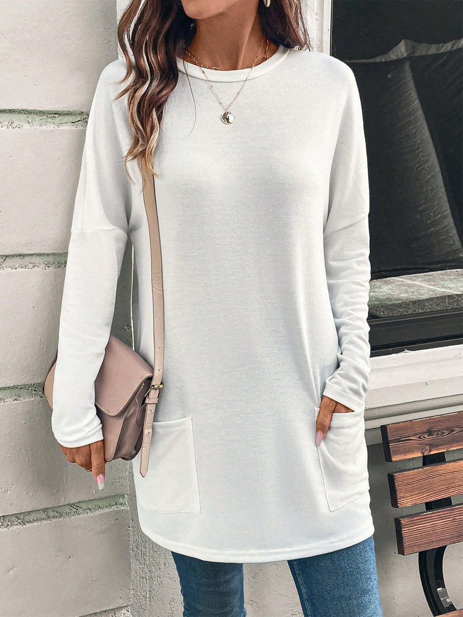 Maglietta donna Valstrend a maniche lunghe, colore solido, collo rotondo e tasca frontale, vestibilità ampia e casual.