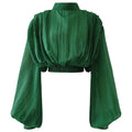 Camicia Valstrend con maniche a lanterna, colletto a stand, maniche lunghe e stile peplo, vista frontale.