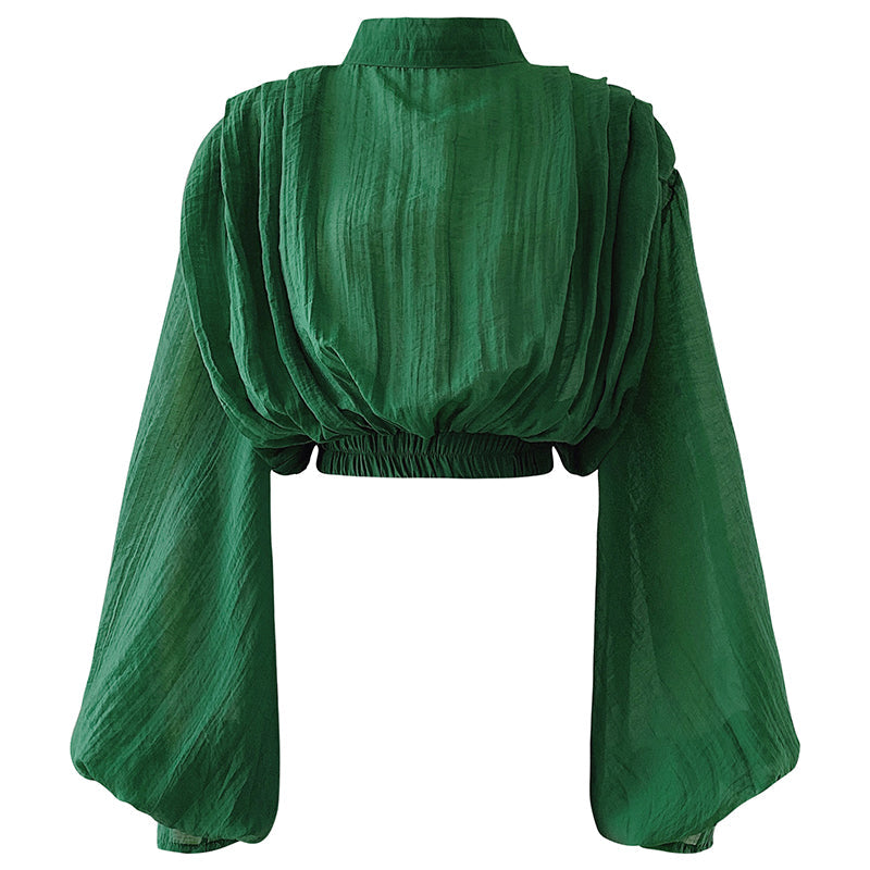 Camicia Valstrend con maniche a lanterna, colletto a stand, maniche lunghe e stile peplo, vista frontale.