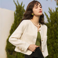 Giacca corta femminile in stile francese retrò con scollo rotondo, marchio Valstrend, tessuto leggero e design elegante.