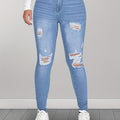 Jeans skinny strappati e lavati da donna Valstrend con taglio slim, alta elasticità e strappi modaioli, denim aderente e trendy.