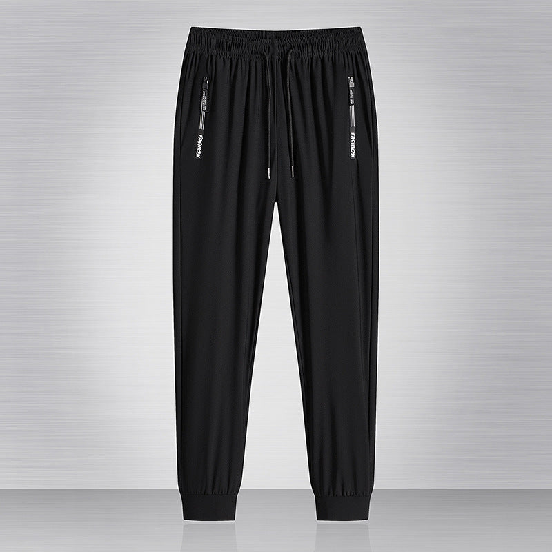 Pantaloni maschili estivi Valstrend in seta sottile, quick-drying, casual e larghi per corsa e relax, visibili in immagine.