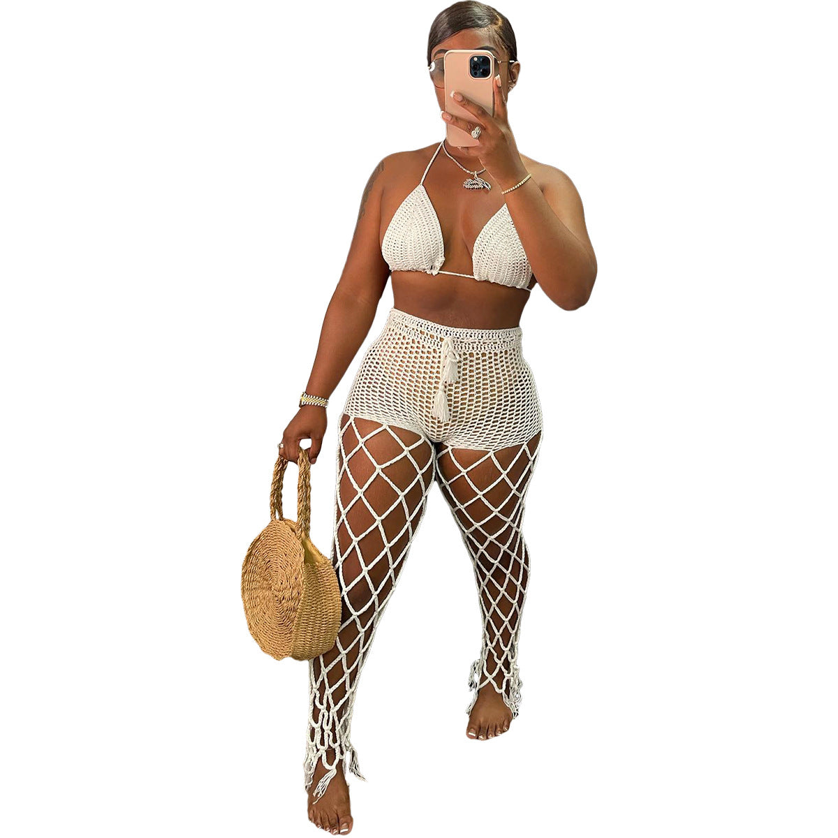 Costume da spiaggia trasparente con motivo traforato e lavorazione all'uncinetto, stile sexy e fashion by Valstrend.
