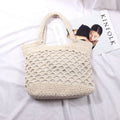 Borsa a spalla femminile Valstrend, moda casual, intrecciata, traforata, stile informale e versatile, vista frontale.