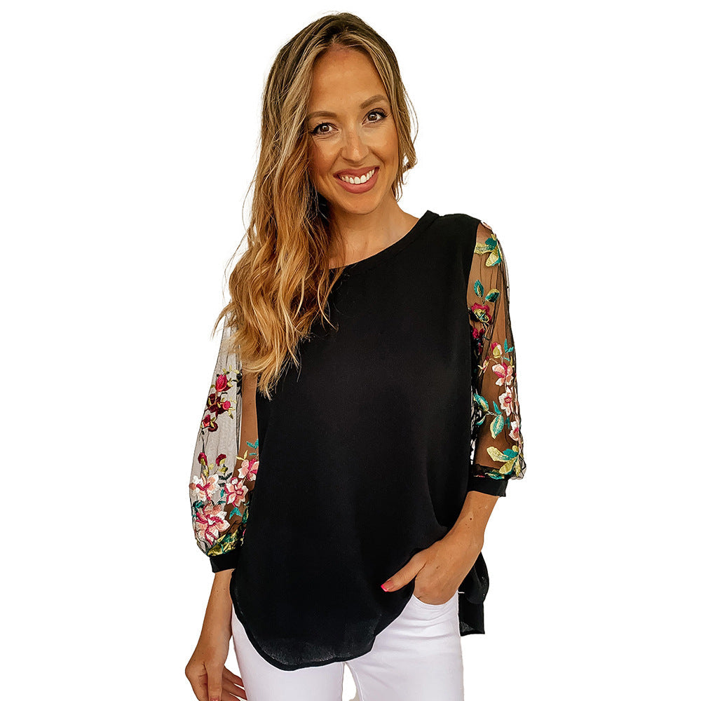 Blusa donna Valstrend con mesh, ricami floreali e dettagli eleganti, vestibilità femminile e stile alla moda.
