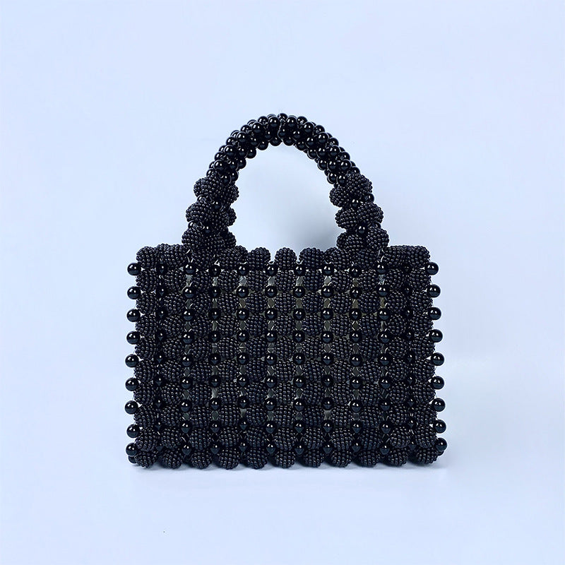 Borsa da sera a mano Valstrend in tessuto intrecciato con dettagli di perle, forma quadrata e design elegante per occasioni speciali.