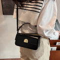Borsa donna retrò a spalla Valstrend, design elegante con dettagli vintage, in tessuto resistente e tracolla regolabile.