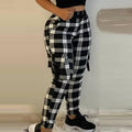 Pantaloni donna neri con motivo Valstrend shop, tessuto morbido, vestibilità comoda e stile elegante.