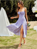 Vestito lungo Valstrend con spalline sottili, stampa floreale e gonna con spacco, ideale per look estivi eleganti.