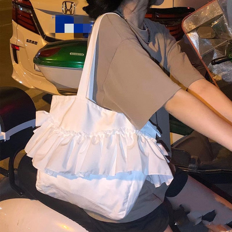 Borsa shopping tote in tessuto colorato con fiocco in pizzo, stile semplice e elegante, perfetta per la spesa quotidiana.