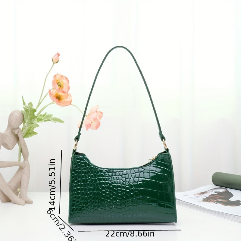 Borsa a tracolla femminile Valstrend in eco-pelle con motivo rettile e dettagli glitter, chiusura lampo sicura, stile elegante e resistente.