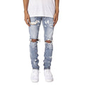 Jeans slim strappati da uomo Valstrend shop in tessuto stretch con dettagli consumati e finiture moderne.