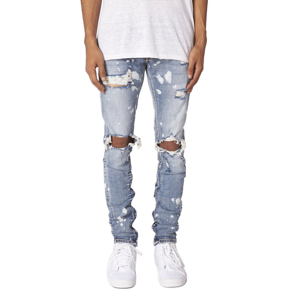 Jeans slim strappati da uomo Valstrend shop in tessuto stretch con dettagli consumati e finiture moderne.