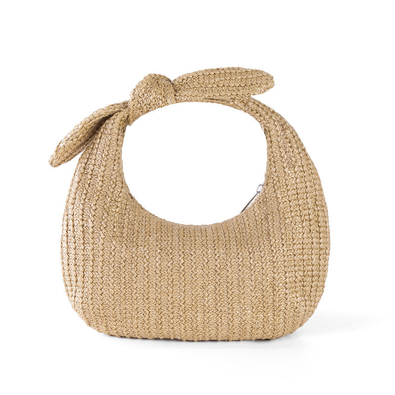 Borsa clutch estiva in paglia con fiocco, stile vacanza, marca Valstrend, con manico e dettagli eleganti.