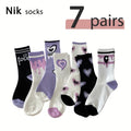 Set di 7 calzini da ragazza Valstrend con motivo cuore, comodi, morbidi ed elastici, ideali come regalo per amici.
