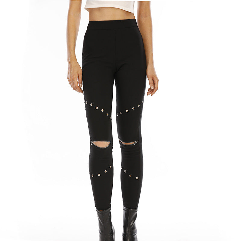 Leggings sportivi taglio cropped nero con cerniera e dettagli di vulnerabilità, marca Valstrend shop, adatte a allenamenti e sport.