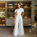 Tuta a maniche corte con pantaloni a palazzo e top crop, stile casual e trendy, marchio Valstrend shop.