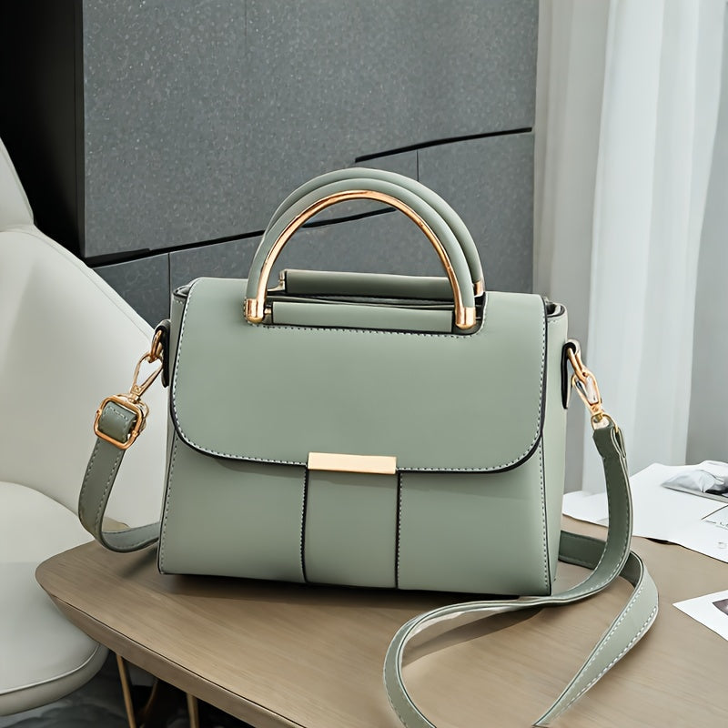 Borsa a tracolla femminile Valstrend con motivo a righe in similpelle waterproof, strap regolabile e chiusura magnetica.