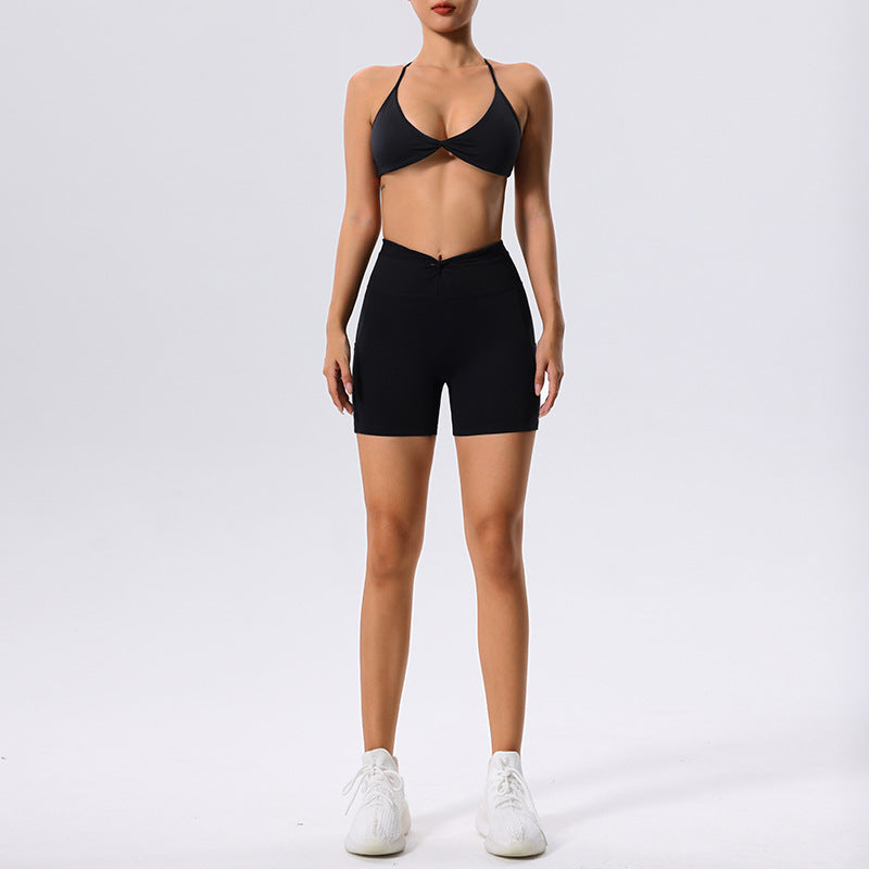 Completo di abbigliamento yoga europeo e americano di Valstrend, con pantaloni e top sportivi shockproof in tessuto elastico.