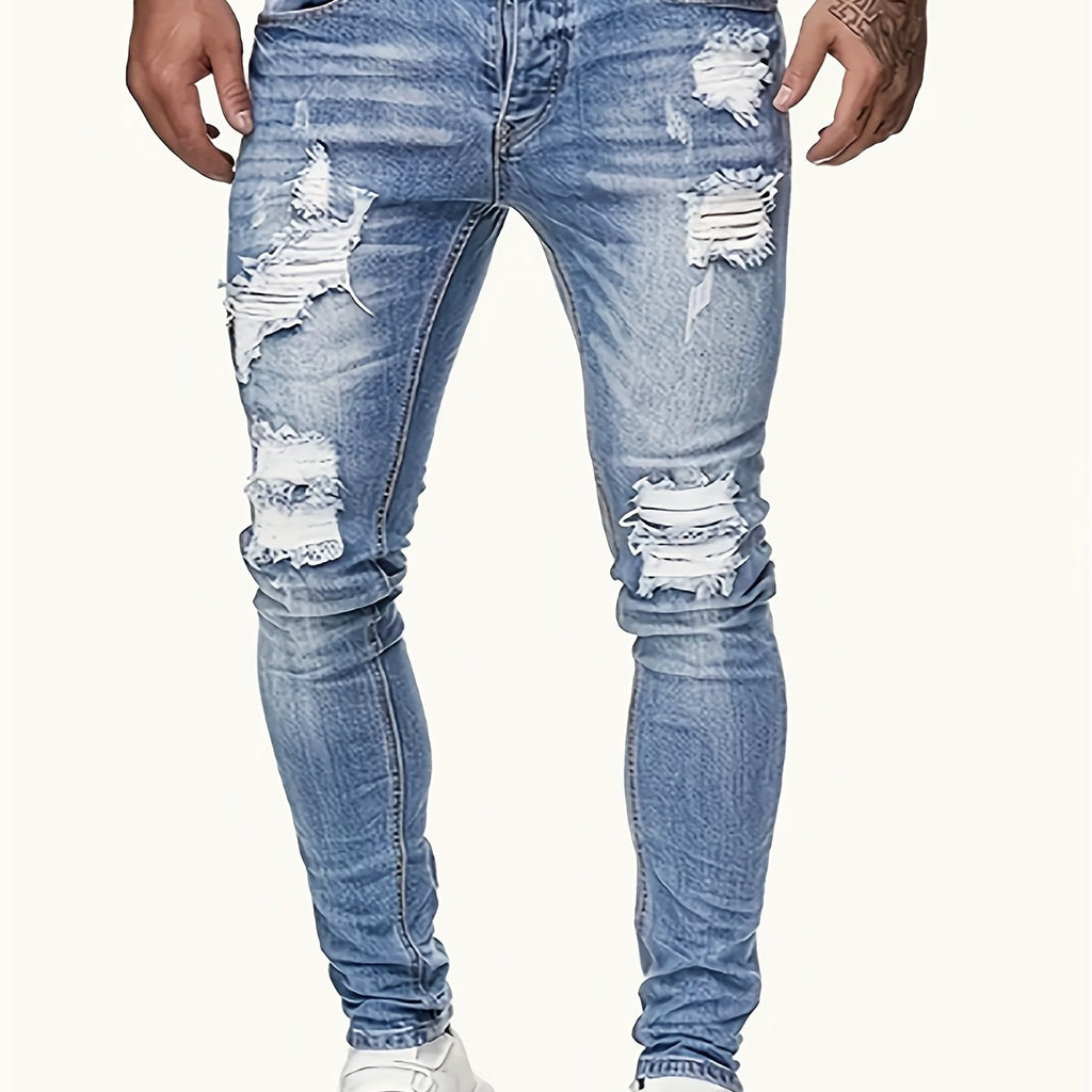 Jeans uomo skinny strappati in denim di Valstrend, vestibilità slim, cotone elasticizzato, lavaggio vintage, lunghezza regolare.