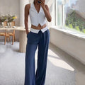 Set due pezzi casual con polo senza maniche, pantaloni larghi in tinta unita, di Valstrend shop, abbigliamento comodo e alla moda