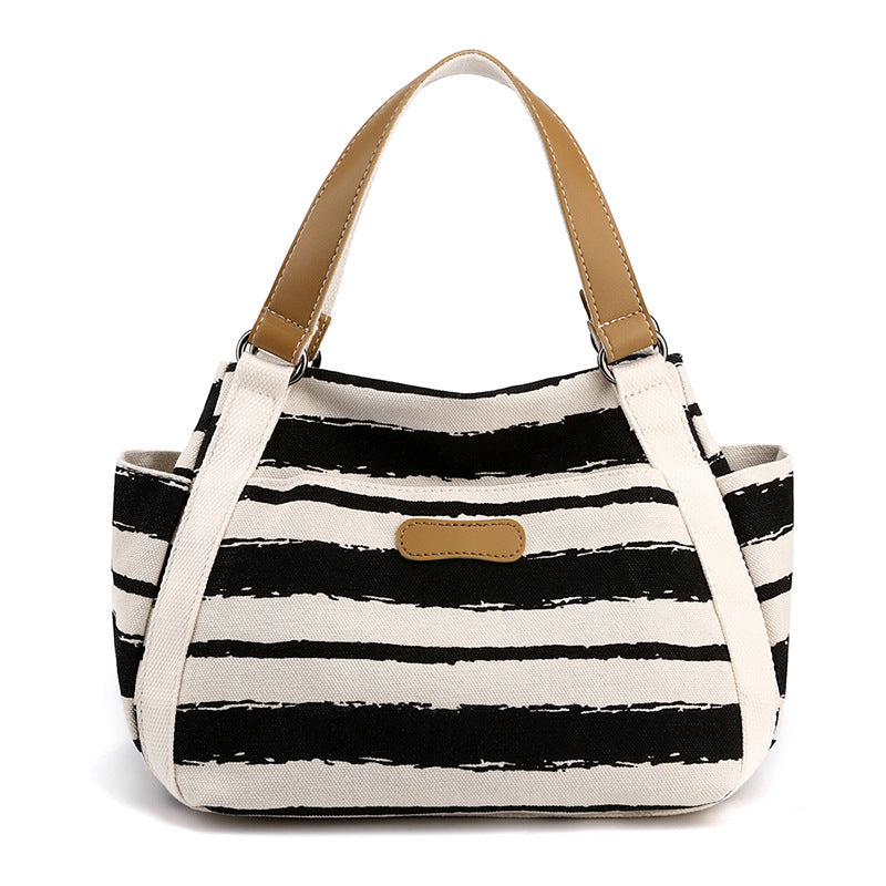 Borsa a tracolla Valstrend in tela outdoor, grande capacità, a righe, con scomparto singolo e stile casual.