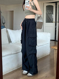 Pantaloni da lavoro donna Valstrend, vita alta sottile, gamba ampia, tessuto leggero e comodo, stile professionale e moderno.