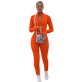 Set sportivo donna con maglione a maniche lunghe e pantaloni multicolori, valstrend, abbigliamento sportivo femminile.
