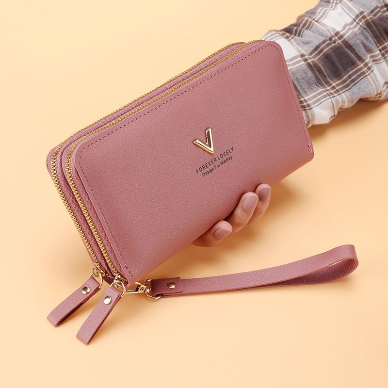 Borsa donna Valstrend con doppio strato, cerniera lunga, grande capacità e design elegante, vista frontale con dettagli in pelle.