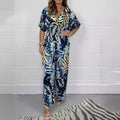 Completo da donna Valstrend con stampa natalizia, pantaloni larghi e stile jumpsuit, ideale per le feste e il relax.