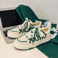 Scarpe sportive retro low cut Valstrend con design etico per allenamento, suola bianca e tomaia in tessuto nero.
