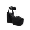 Sandali da donna Valstrend con tacco alto, punta aperta, finitura opaca e fibbia decorativa, ideali per look eleganti e alla moda.
