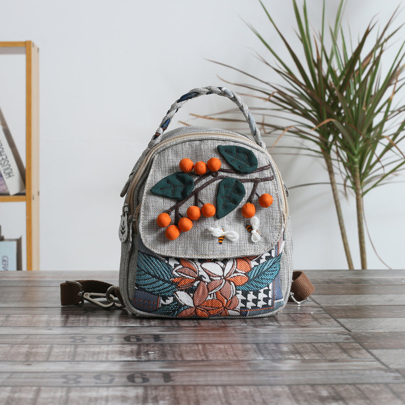 Zaino leggero in canvas casual con decorazione a mano di persimmon Ruyi, design tridimensionale, marca Valstrend.