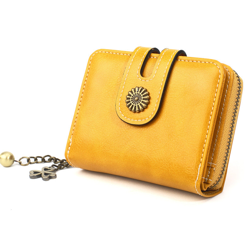 Portafoglio portamonete in pelle oleosa Valstrend, piccolo porta carte da donna con pendente elegante e scomparti pratici.