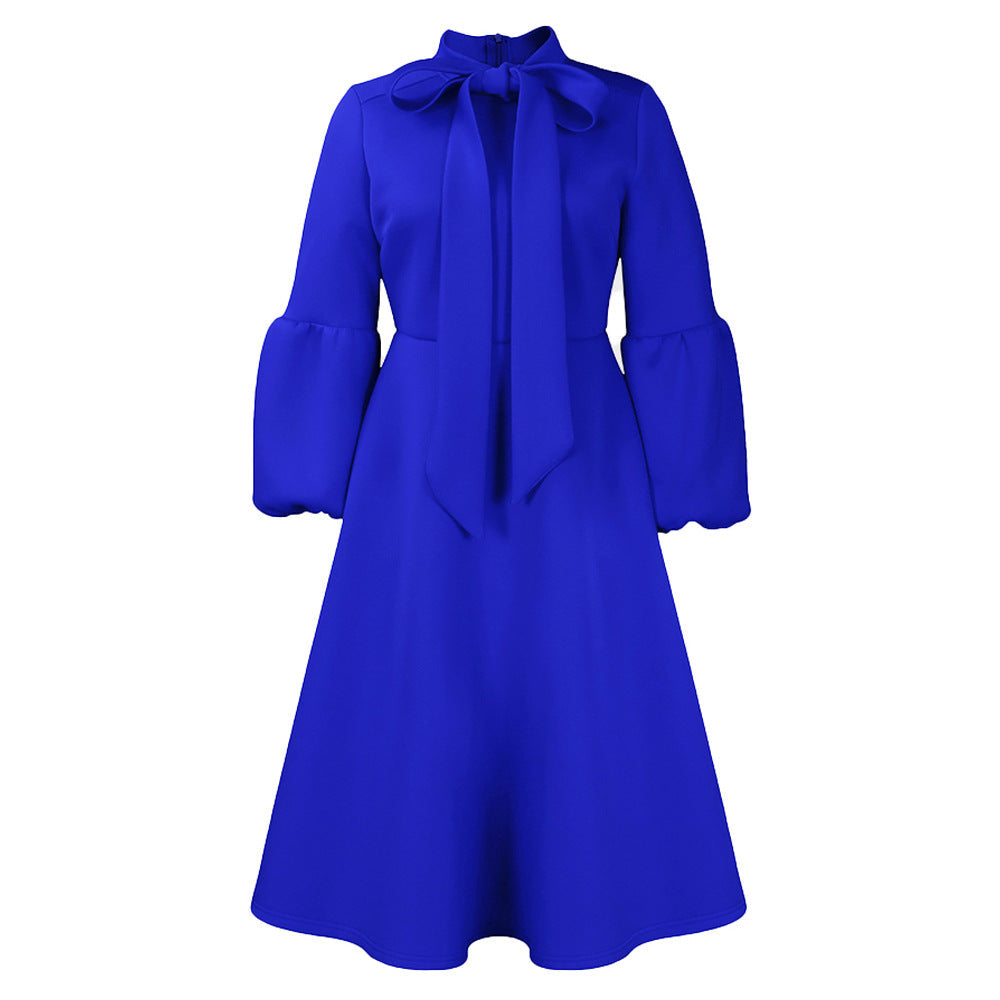 Vestito lungo a vita alta con maniche a sbuffo, fiocco e dettagli in pizzo, marca Valstrend shop.