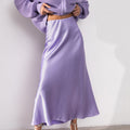 Gonna lunga a maniche lunghe in seta artificiale con vita alta, gonna a sirena elegante con spacchi e drappeggio satinato.