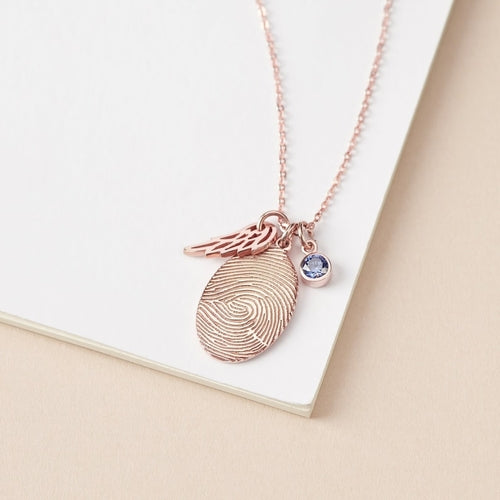 Collana con impronta digitale e pietra di nascita in oro rosa di Sajishop, gioielli personalizzati e eleganti.