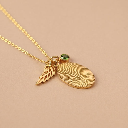 Collana con impronta digitale e pietra di nascita in oro rosa, gioielli personalizzati di Sajishop, vista laterale.