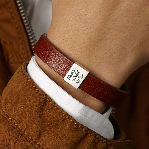 Bracciale uomo Sajishop in nero e oro per la perdita di un bambino, con dettagli eleganti e simbolici.