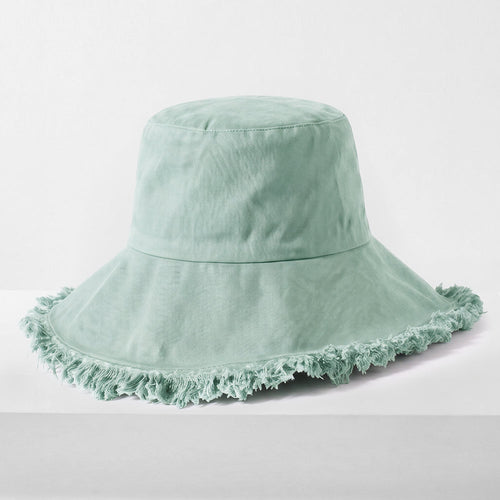 Cappello bucket con frange in tessuto lavanda di Sajishop, stile casual e alla moda, con finiture sghembe e cinturino.